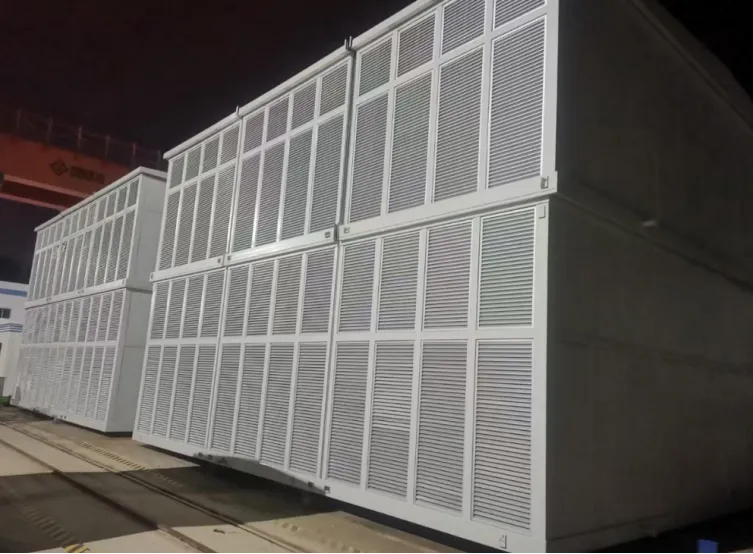 Stacked modular container data centers with large louvered ventilation walls